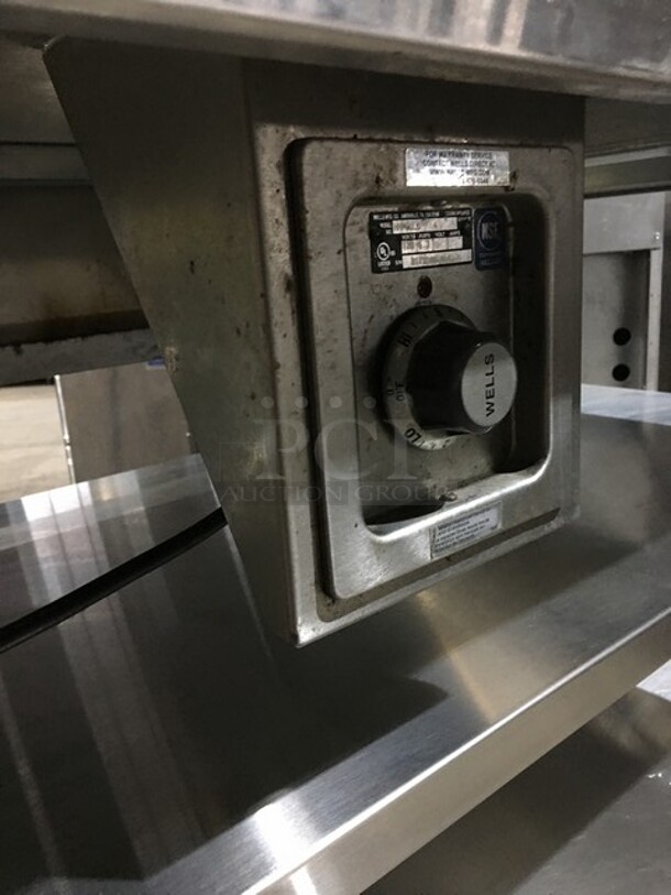 AMAZING! Wells Commercial Work/Prep Table! With Built In Rectangular Warmer! With Thermostat Control! With 2 Shelf Underneath Storage Space! All Stainless Steel! With Backsplash! Model HMP6ULD Serial BITTD061800246! 120V! On Legs! - Image 9 of 12