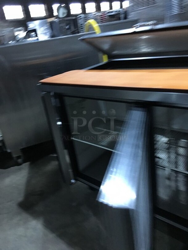 True Refrigerated 3 Door Stainless Steel Sandwich Prep Table! With Poly Coated Racks! With Wooden Cutting Board! Model TSSU7218 Serial 7296098! 115V 1Phase! On Commercial Casters! - Image 5 of 10