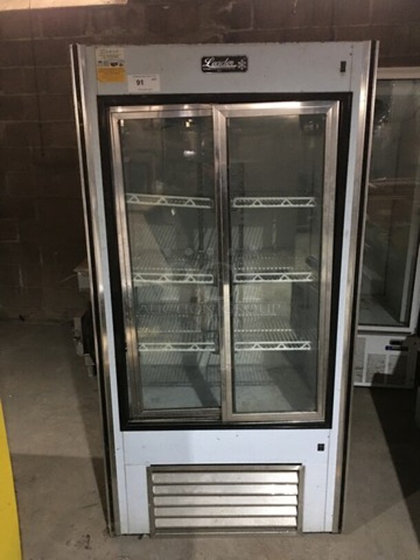 Leader Reach In Cooler Merchandiser! With 2 Glass Sliding Doors! With Poly Coated Racks! Model LS38SC Serial PZ01C1816! 115V 1 Phase! - Image 1 of 9