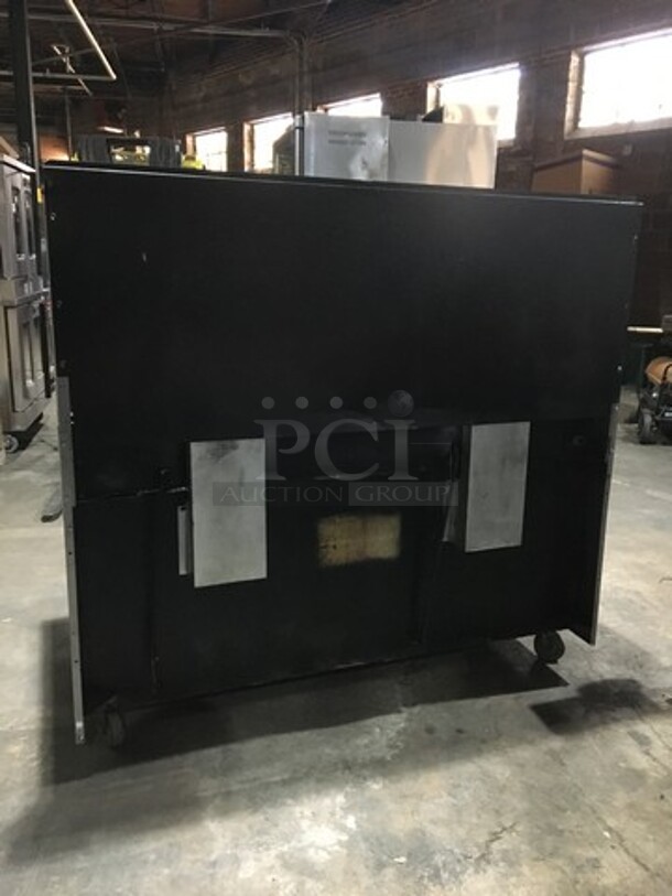 All Stainless Steel Natural Gas Powered 10 Burner Stove! With 2 Full Size Ovens Underneath! With Backsplash! On Commercial Casters! - Image 2 of 9