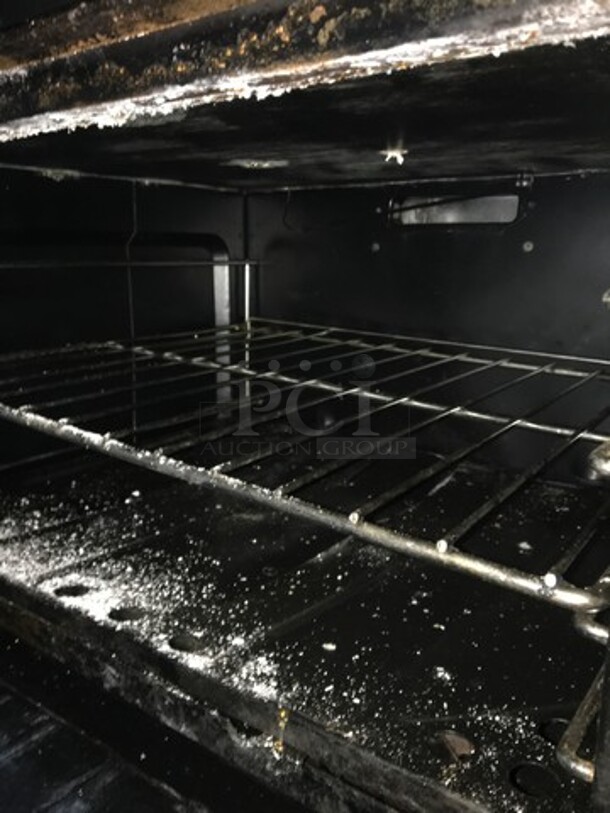 All Stainless Steel Natural Gas Powered 10 Burner Stove! With 2 Full Size Ovens Underneath! With Backsplash! On Commercial Casters! - Image 5 of 9