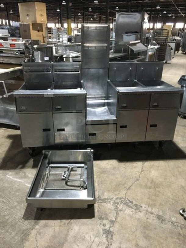 GREAT! Pitco Commercial Natural Gas Powered 4 Bay Deep Fat Fryer! With Middle Frying Basket Rack! With Oil Filter System! With Backsplash! All Stainless Steel! Model SGH50 Serial Serial G11CC009856! On Casters!