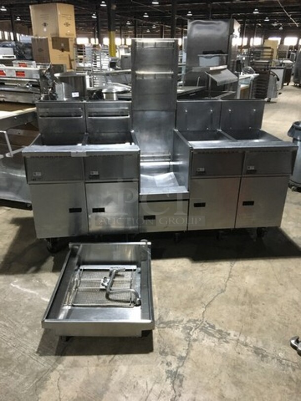 GREAT! Pitco Commercial Natural Gas Powered 4 Bay Deep Fat Fryer! With Middle Frying Basket Rack! With Oil Filter System! With Backsplash! All Stainless Steel! Model SGH50 Serial Serial G11CC009856! On Casters! - Image 1 of 12