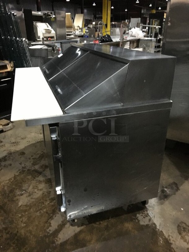 Beverage Air Commercial Refrigerated Sandwich/Salad Prep Table! With 2 Doors Underneath Storage Space! With Poly Coated Racks! With Commercial Cutting Board! All Stainless Steel! Model SP6024M! 115V 1Phase! On Commercial Casters! - Image 4 of 11
