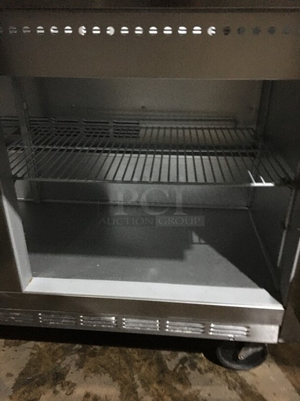 Beverage Air Commercial Refrigerated Sandwich/Salad Prep Table! With 2 Doors Underneath Storage Space! With Poly Coated Racks! With Commercial Cutting Board! All Stainless Steel! Model SP6024M! 115V 1Phase! On Commercial Casters! - Image 6 of 11
