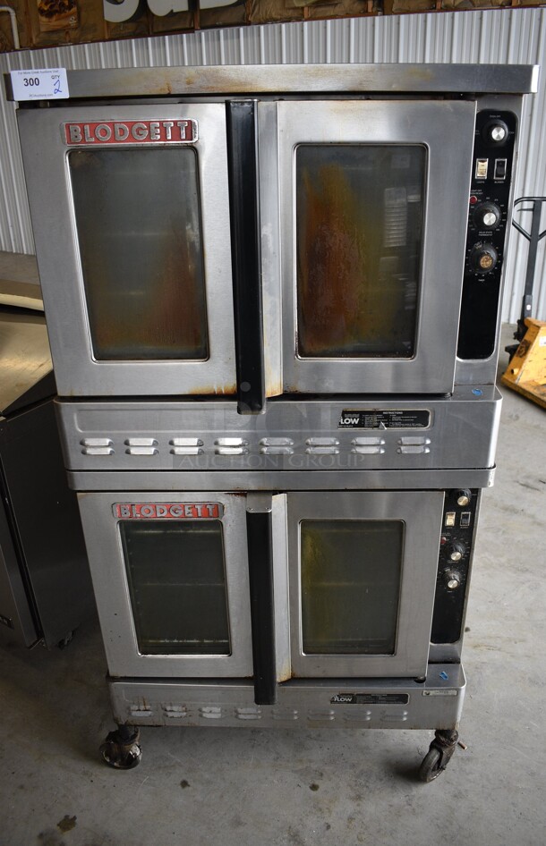 2 FANTASTIC! Blodgett Stainless Steel Commercial Gas Powered Full Size Convection Oven w/ View Through Doors, Metal Oven Racks and Thermostatic Controls on Commercial Casters. 38x38x73. 2 Times Your Bid!