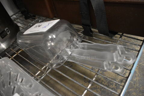 2 Clear Poly Ice Scoops. 12x4x3. 2 Times Your Bid!