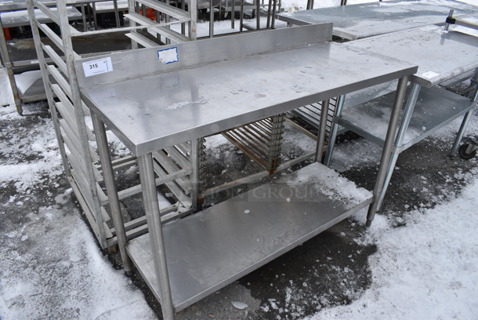 Stainless Steel Commercial Table w/ Metal Undershelf and Backsplash. 52x20x40