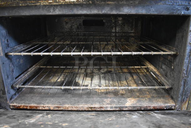 FANTASTIC! Stainless Steel Commercial Gas Powered 10 Burner Range w/ 2 Ovens and Overshelf on Commercial Casters. 60x32x57 - Image 8 of 9