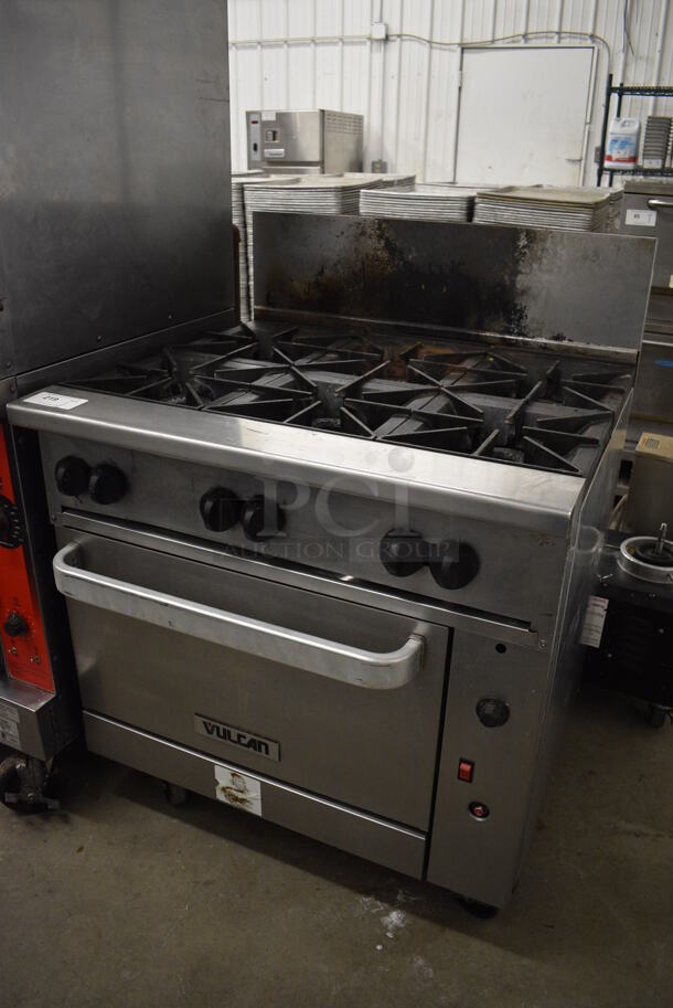 AWESOME! Vulcan Stainless Steel Commercial Floor Style Gas Powered 6 Burner Range w/ Oven and Backsplash on Commercial Casters. 36x34x48 - Image 2 of 8