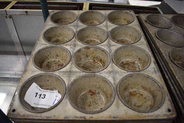 12 Metal 12 Cup Muffin Baking Pans. 13.5x18x2. 12 Times Your Bid! - Image 3 of 3
