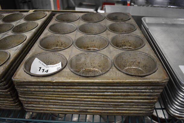 12 Metal 12 Cup Muffin Baking Pans. 13.5x18x2. 12 Times Your Bid!