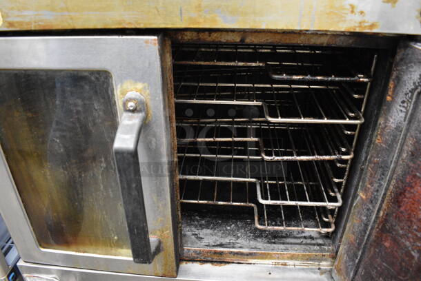 2 FANTASTIC! Vulcan Model VC4GD-11D150K Stainless Steel Commercial Gas Powered Full Size Convection Oven w/ View Through Doors, Metal Oven Racks and Thermostatic Controls on Commercial Casters. 40x31x70. 2 Times Your Bid! - Image 6 of 11