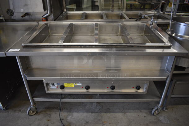 NICE! Atlas Metal Model WIH-D&M-47 Stainless Steel Commercial Floor Style Electric Powered 4 Well Steam Table w/ Undershelf on Commercial Casters. 208 Volts, 1 Phase. 66x37x37 - Image 1 of 6