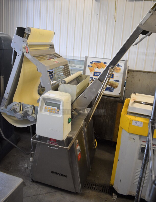 BEAUTIFUL! LATE MODEL! Rondo Stainless Steel Commercial Floor Style Reversible Dough Sheeter w/ Cutting Station. 250 Volts, 3 Phase. 117x42x56. Closed: 77x42x82 - Image 1 of 12
