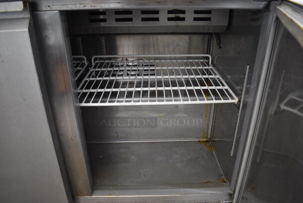 SWEET! Avantco Model 178SCL2 Stainless Steel Commercial Sandwich Salad Prep Table w/ Overshelf and Cutting Board on Commercial Casters. 115 Volts, 1 Phase. 47x31x66. Tested and Powers On But Does Not Get Cold - Image 5 of 7