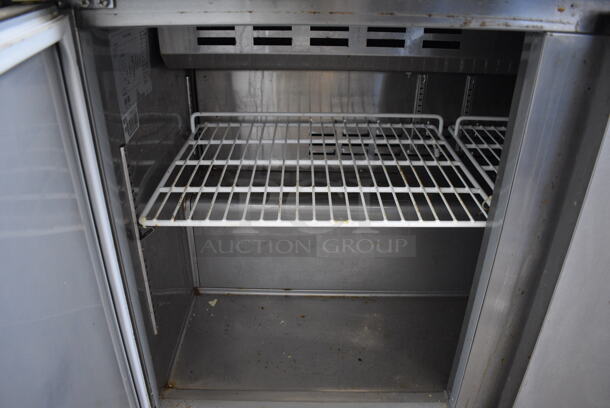 SWEET! Avantco Model 178SCL2 Stainless Steel Commercial Sandwich Salad Prep Table w/ Overshelf and Cutting Board on Commercial Casters. 115 Volts, 1 Phase. 47x31x66. Tested and Powers On But Does Not Get Cold - Image 6 of 7