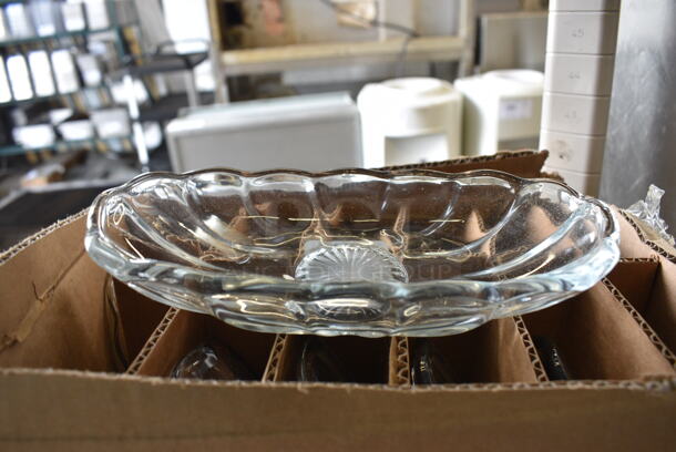 12 BRAND NEW IN BOX! Glass Dishes. 8x4x1.5. 12 Times Your Bid!