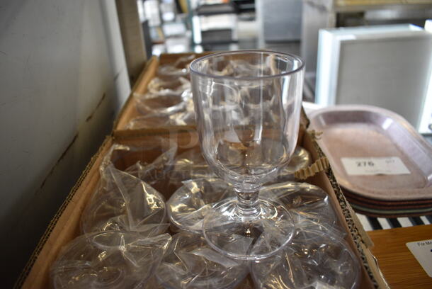 12 BRAND NEW IN BOX! Clear Poly Wine Glasses. 3x3x5.5. 12 Times Your Bid! - Image 2 of 2