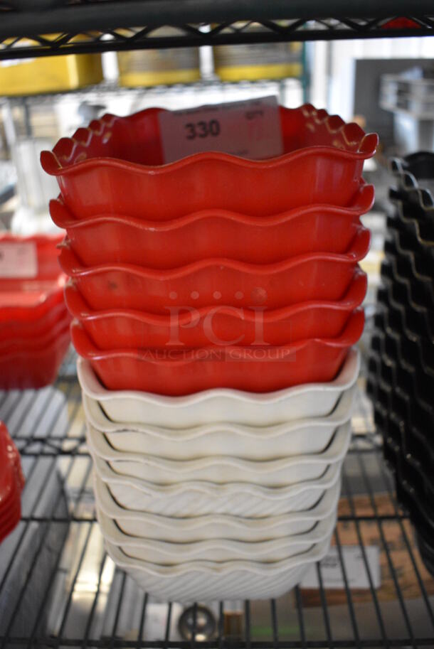 12 Poly Bowls; 5 Red and 7 White. 7x10.5x3. 12 Times Your Bid!