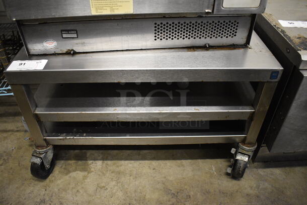 Stainless Steel Commercial Equipment Stand w/ 2 Undershelves on Commercial Casters. 30x30x17.5