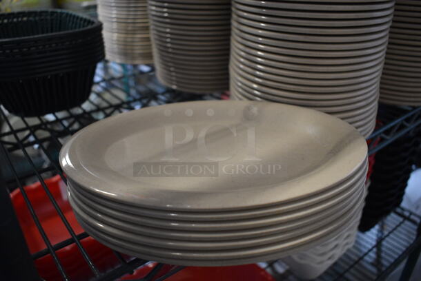 48 Tan Poly Oval Plates. 9.5x7.5x1. 48 Times Your Bid!