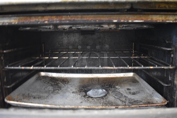 GREAT! Garland Stainless Steel Commercial Electric Powered 6 Burner Range w/ Oven, Overshelf and Backsplash on Commercial Casters. 36x34.5x57 - Image 6 of 6