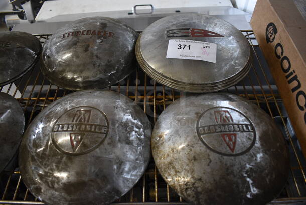 8 Various Metal Hubcap Parts Including 2 Dodge, 1 Studebaker, 3 Oldsmobile. Includes 10x10x3. 8 Times Your Bid! - Image 2 of 4