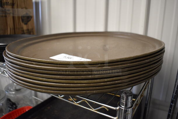 9 Brown Oval Serving Trays. 24x19.5x1. 9 Times Your Bid!