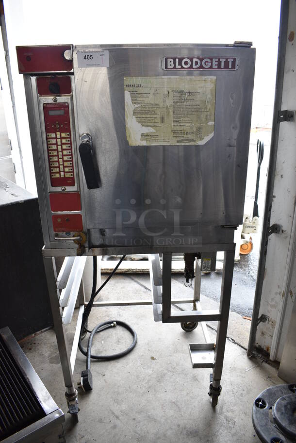 FANTASTIC! Blodgett Model LXL50EC Stainless Steel Commercial Electric Powered Single Compartment Convection Oven on Commercial Casters. 208 Volts, 3 Phase. 32x36x69 - Image 1 of 7