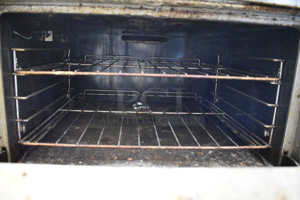 GREAT! Southbend Stainless Steel Commercial Gas Powered 6 Burner Range w/ Oven and Backsplash on Commercial Casters. 32x38x72 - Image 6 of 9