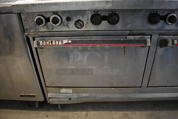 GREAT! Garland Stainless Steel Commercial Gas Powered 10 Burner Range w/ 2 Ovens and Backsplash on Commercial Casters. 60x34x56 - Image 6 of 9