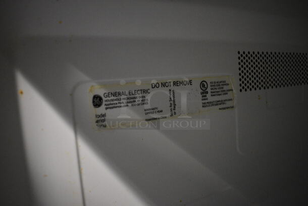General Electric Chrome Finish Countertop Microwave Oven w/ Plate. 24x18x14 - Image 5 of 5