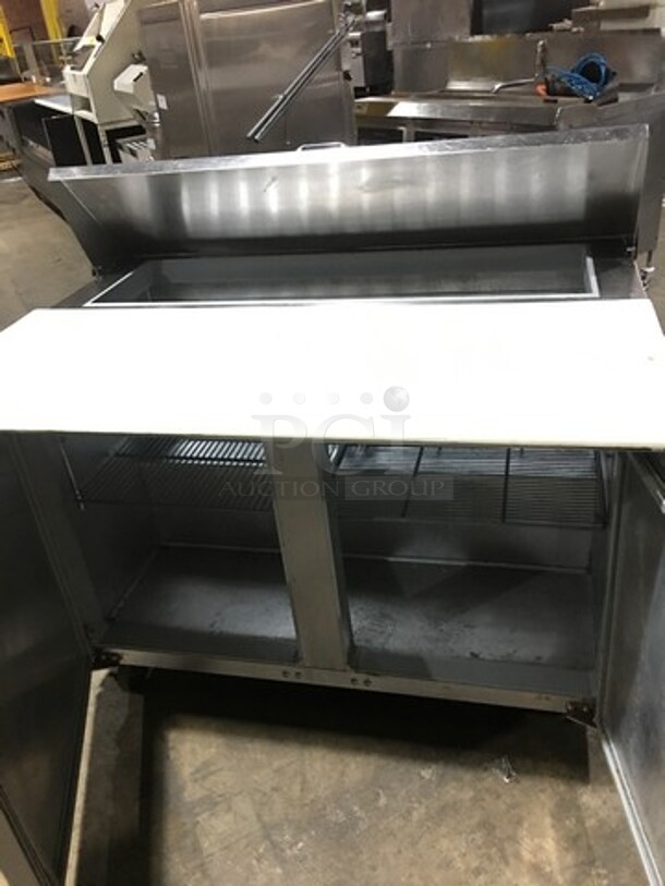 Continental Commercial Refrigerated Sandwich Prep Table! With 2 Door Underneath Storage Space! All Stainless Steel! Model SW4812C Serial 1530287! 115V 1Phase! On Commercial Casters! - Image 5 of 9