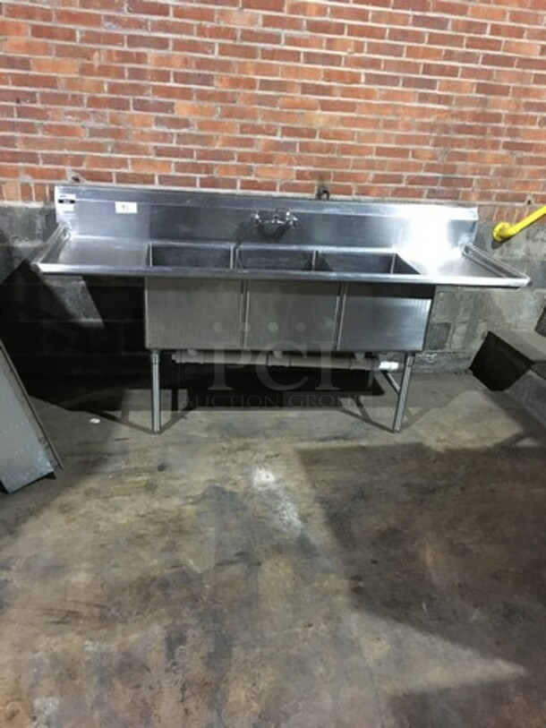 NICE! Sauber Select Commercial 3 Compartment Sink! With Left & Right Side Drainboards! All Stainless Steel! Model PA0010! On Legs! - Image 1 of 10