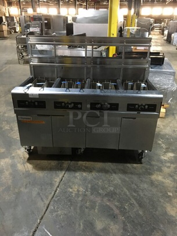 AMAZING! Frymaster Commercial Natural Gas Powered 4 Bay Deep Fat Fryers! With Backsplash! With 8 Metal Frying Baskets! With Grease Filter! All Stainless Steel! Model FPPH455SC Serial 1301IF0051! 110/120V 1Phase! On Commercial Casters!