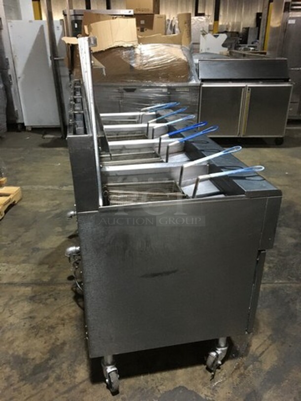 AMAZING! Frymaster Commercial Natural Gas Powered 4 Bay Deep Fat Fryers! With Backsplash! With 8 Metal Frying Baskets! With Grease Filter! All Stainless Steel! Model FPPH455SC Serial 1301IF0051! 110/120V 1Phase! On Commercial Casters! - Image 4 of 12