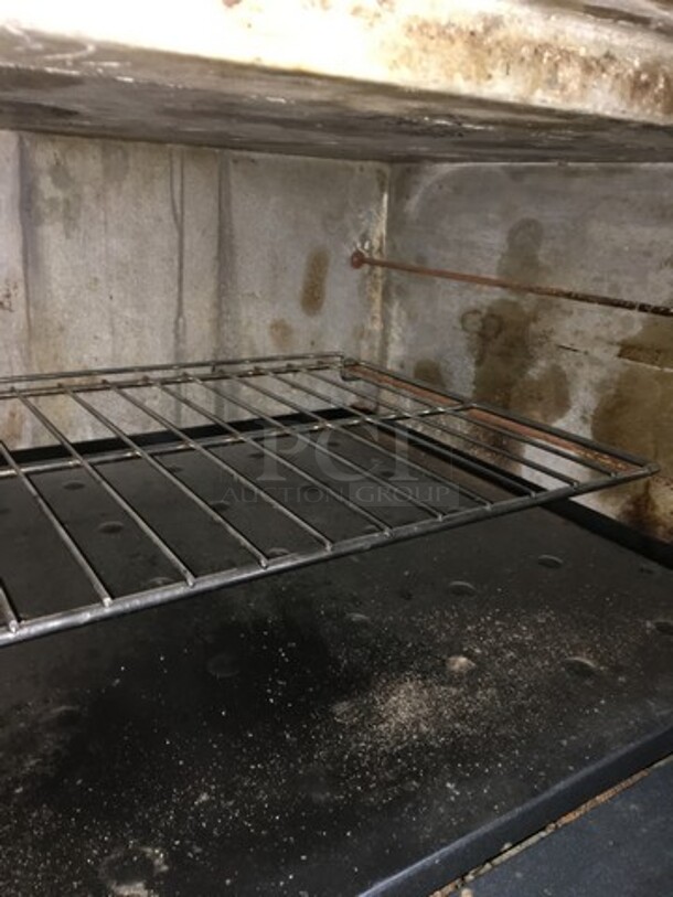Southbend Commercial Natural Gas Powered 6 Burner Stove! With Right Side Flat Griddle/Cheese Melter Combo! With Backsplash & Overhead Garland Salamander! With 2 Full Size Ovens Underneath! All Stainless Steel! On Commercial Casters! - Image 6 of 11