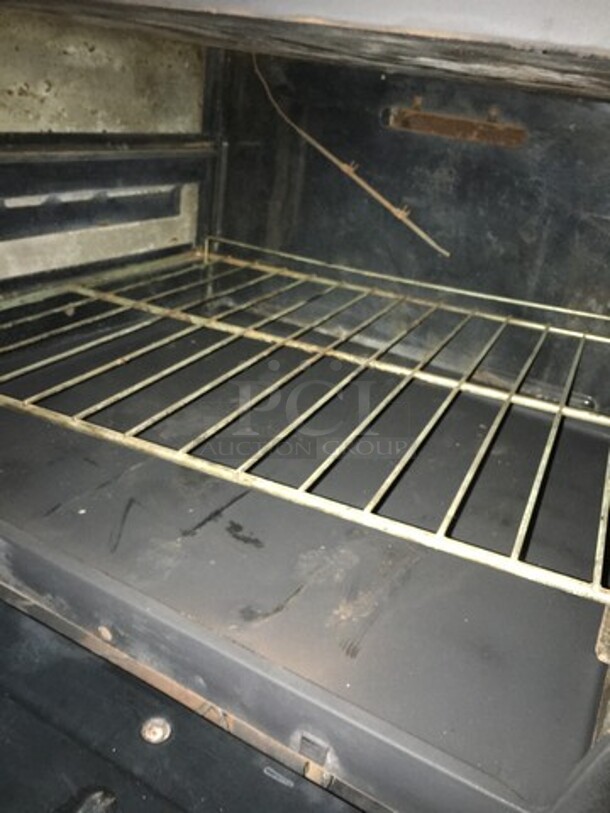 Commercial Natural Gas Powered 6 Burner Stove! With Right Side Flat Griddle! With Raised Backsplash & Salamander Shelf! With Full Size Oven & Storage Space Underneath!  - Image 9 of 12
