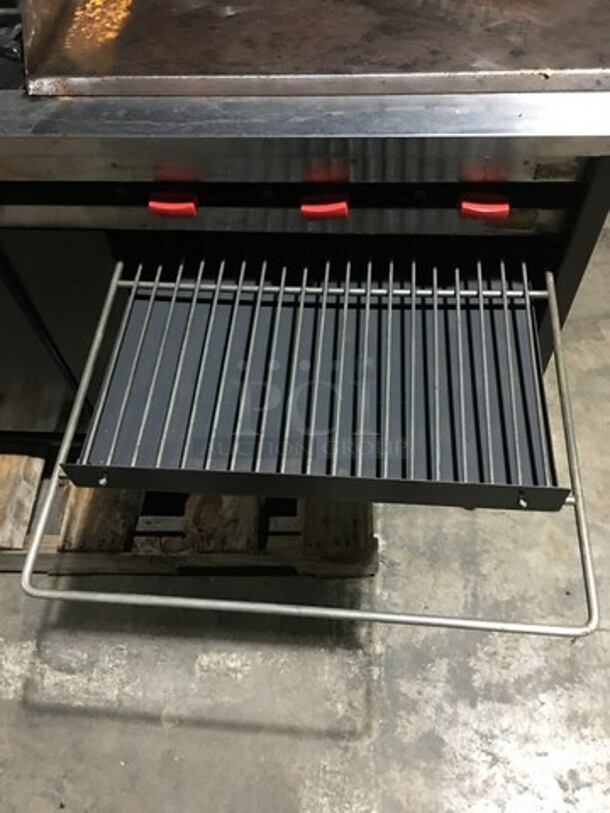 Commercial Natural Gas Powered 6 Burner Stove! With Right Side Flat Griddle! With Raised Backsplash & Salamander Shelf! With Full Size Oven & Storage Space Underneath!  - Image 10 of 12