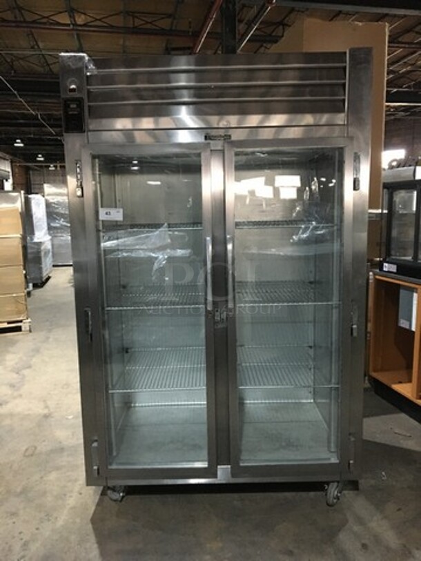 Traulsen Commercial Reach In 2 Door Cooler Merchandiser! All Stainless Steel Body! With Poly Coated Racks! Model AHT232NREFHG Serial T251270I98! 115V 1Phase! On Casters!