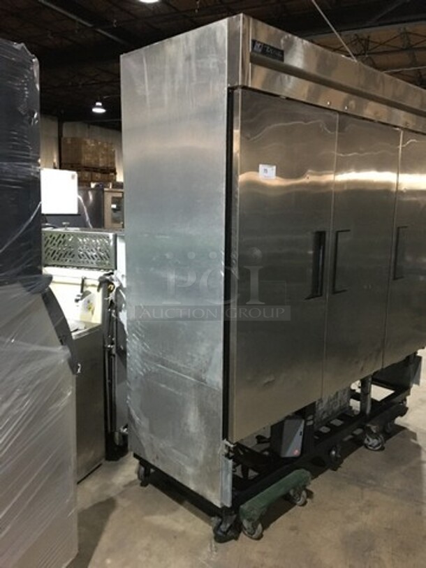 True Commercial 3 Door Reach In Freezer! With Poly Coated Racks! All Stainless Steel! Model T72F Serial 14148183! 115/208/230V 1Phase! On Casters!
 - Image 2 of 8