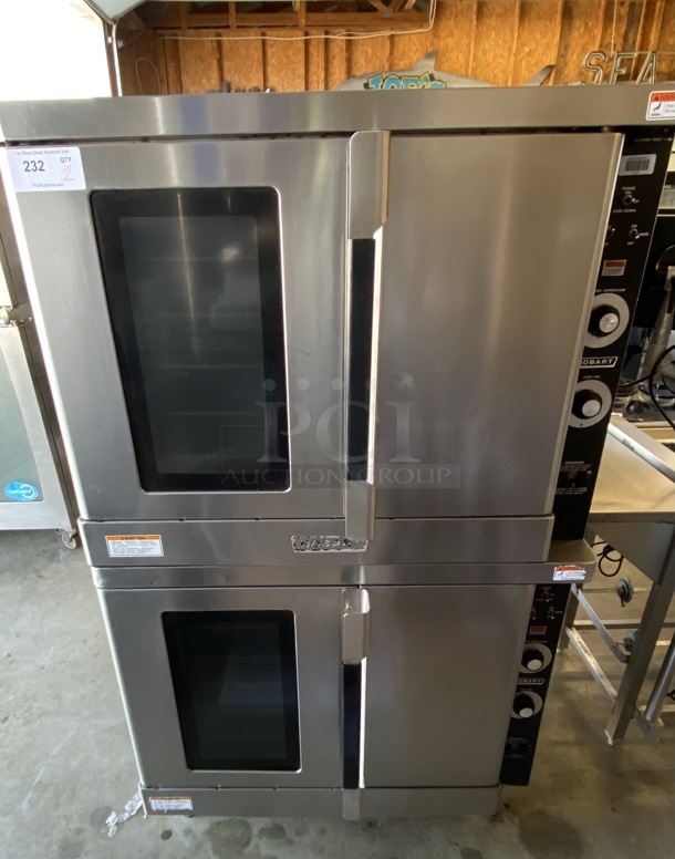 2 GORGEOUS! Hobart Model HEC40 Stainless Steel Commercial Electric Powered Full Size Convection Ovens w/ View Through Door, Solid Door, Metal Oven Racks and Thermostatic Controls. 480 Volts, 3 Phase. 38x36x67. 2 Times Your Bid!
