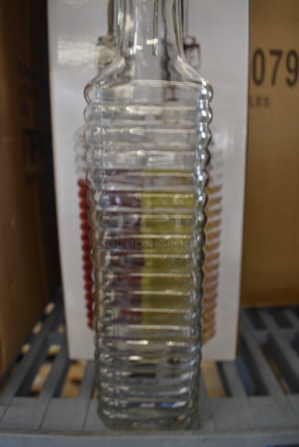 11 BRAND NEW IN BOX! Sets of Two Europeware Glass Oil & Vinegar Bottles. 2x2x12. 11 Times Your Bid! - Image 3 of 4