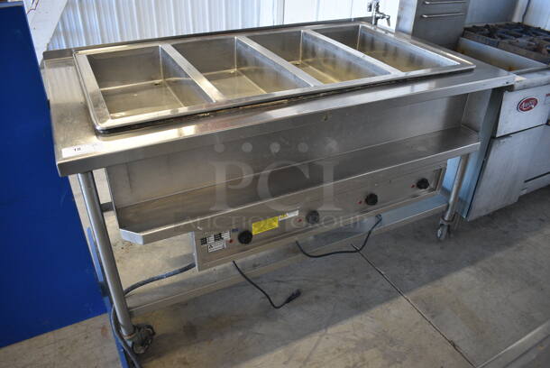 GREAT! Atlas Model WIH-D&M-47 Stainless Steel Commercial Floor Style Electric Powered 4 Bay Steam Table w/ Undershelf on Commercial Casters. 208 Volts, 1 Phase. 66x36x38