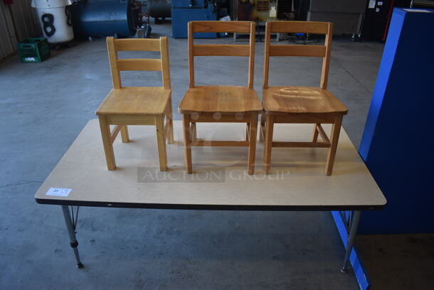 Table w/ 3 Various Wooden Children's Chairs. 60x30x20, 14x14x24, 12x12x22