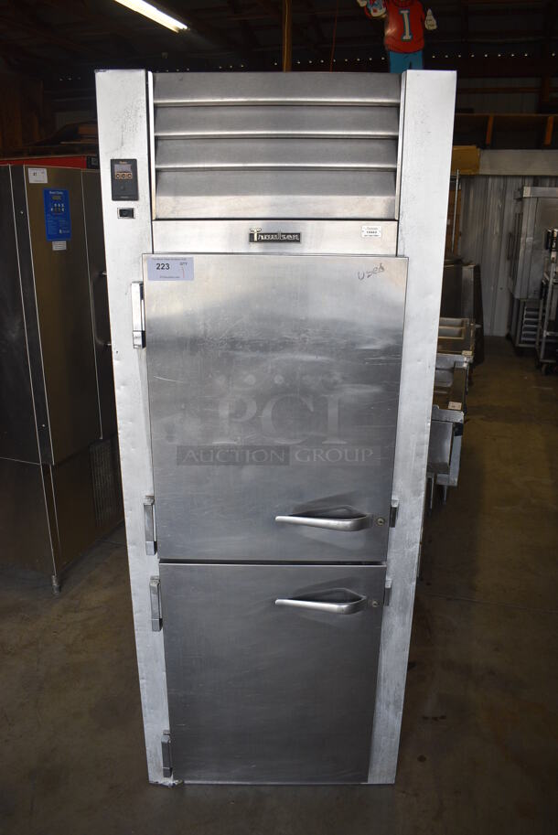 NICE! Traulsen Model G12001 Stainless Steel Commercial 2 Half Size Door Reach In Freezer. 115 Volts, 1 Phase. 30x35x78. Tested and Powers On But Does Not Get Cold
