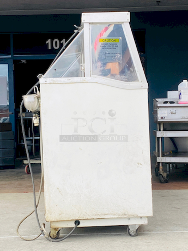 HussMann DCSG-16 88" Ice Cream Dipping Cabinet 16 Flavor w/ Straight Glass.

115v 1ph 10.5amp 60hz

88"x27"x51"

In Use Prior to Removal.  - Image 2 of 8