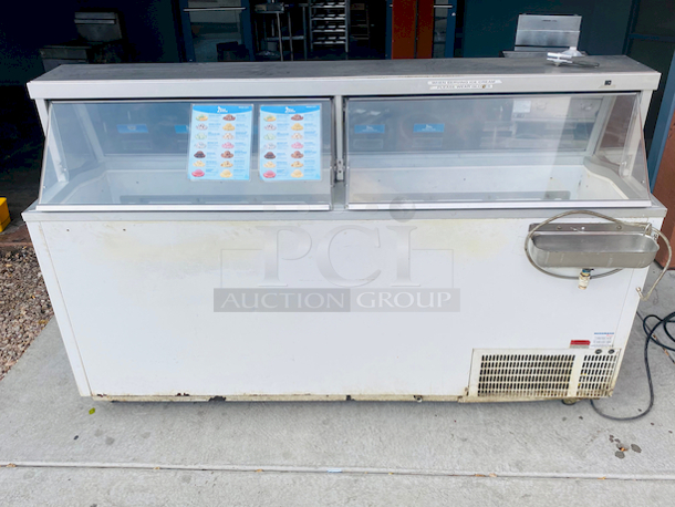 HussMann DCSG-16 88" Ice Cream Dipping Cabinet 16 Flavor w/ Straight Glass.

115v 1ph 10.5amp 60hz

88"x27"x51"

In Use Prior to Removal.  - Image 5 of 8