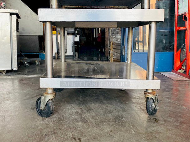 SWEET! Stainless Steel Equipment Stand with Undershelf on Commercial Casters.

26x30x24


